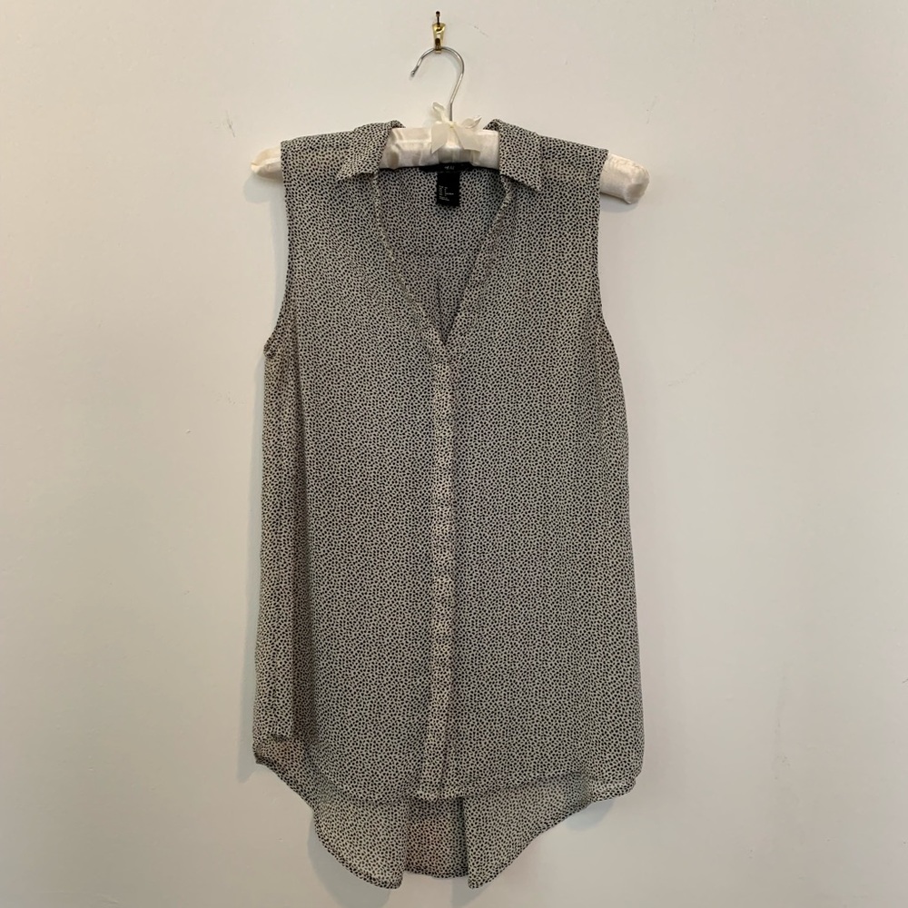 Lovely button up tank top.
